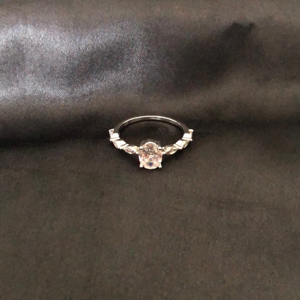 Described on purchase as Moissanite Pigeon Egg Ring